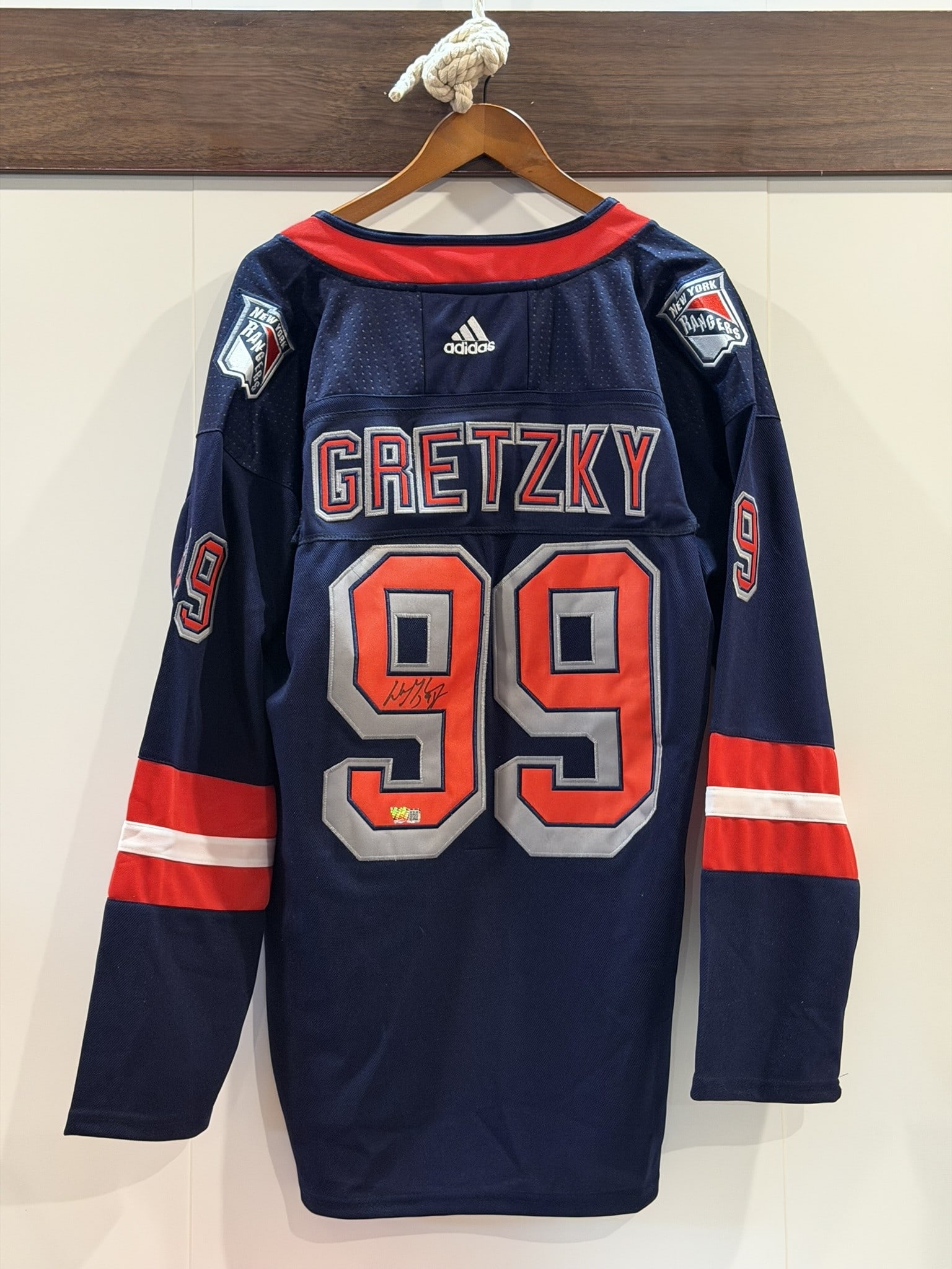 Wayne Gretzky Signed NY Rangers #99 Jersey ACE COA NWOT: New York Rangers jersey personally signed by Wayne Gretzky across the reverse number "99." The jersey features the Rangers Liberty alternate design with Gretzky nameplate and player number 99. Include