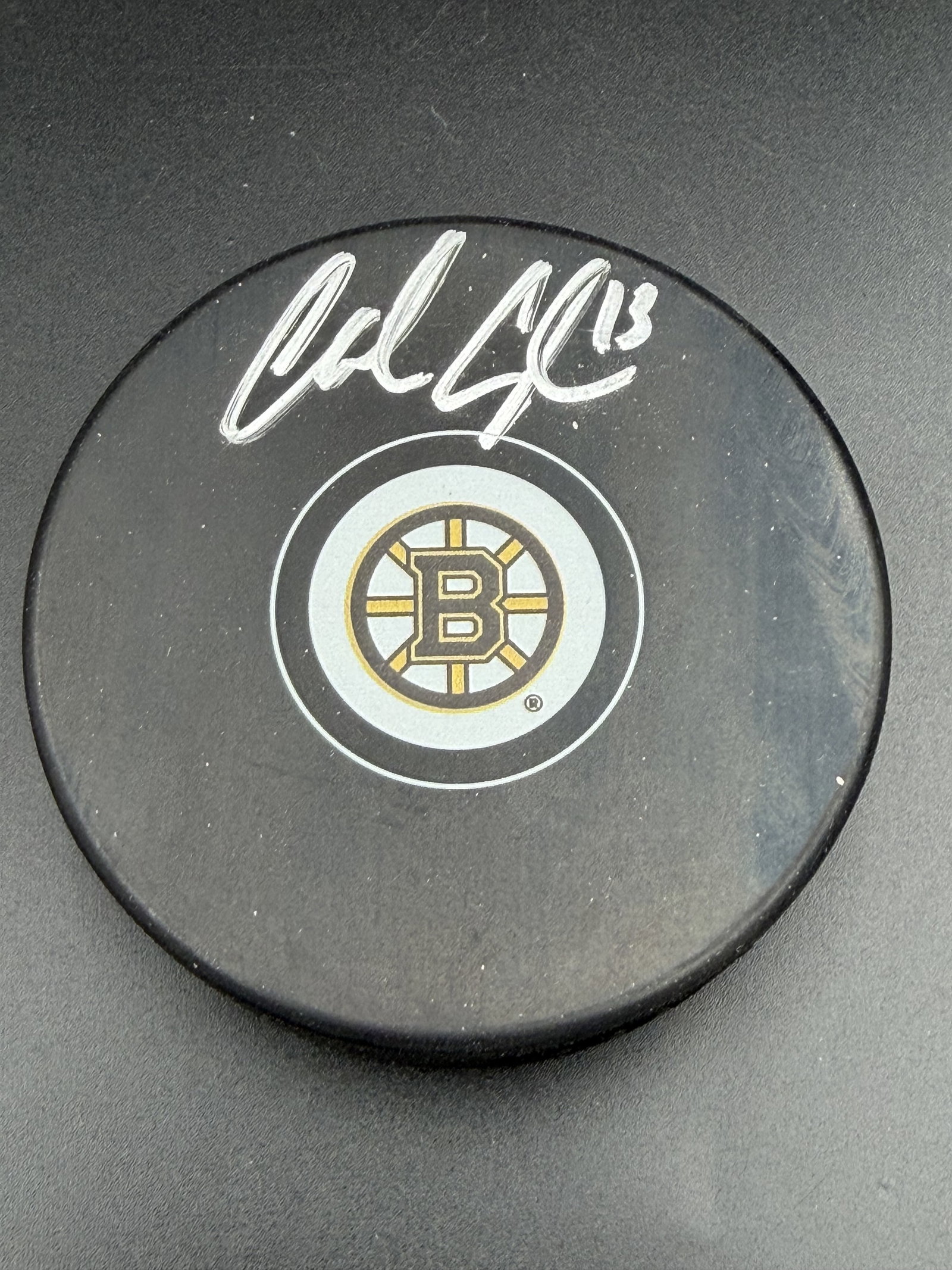 Charlie Coyle Boston Bruins Signed NHL Puck JSA COA New: NHL Puck signed with white marker by Boston Bruins Charlie Coyle. Includes a JSA Certificate of Authenticity (COA) and/or matching authentication sticker with QR code as shown in the accompanying phot