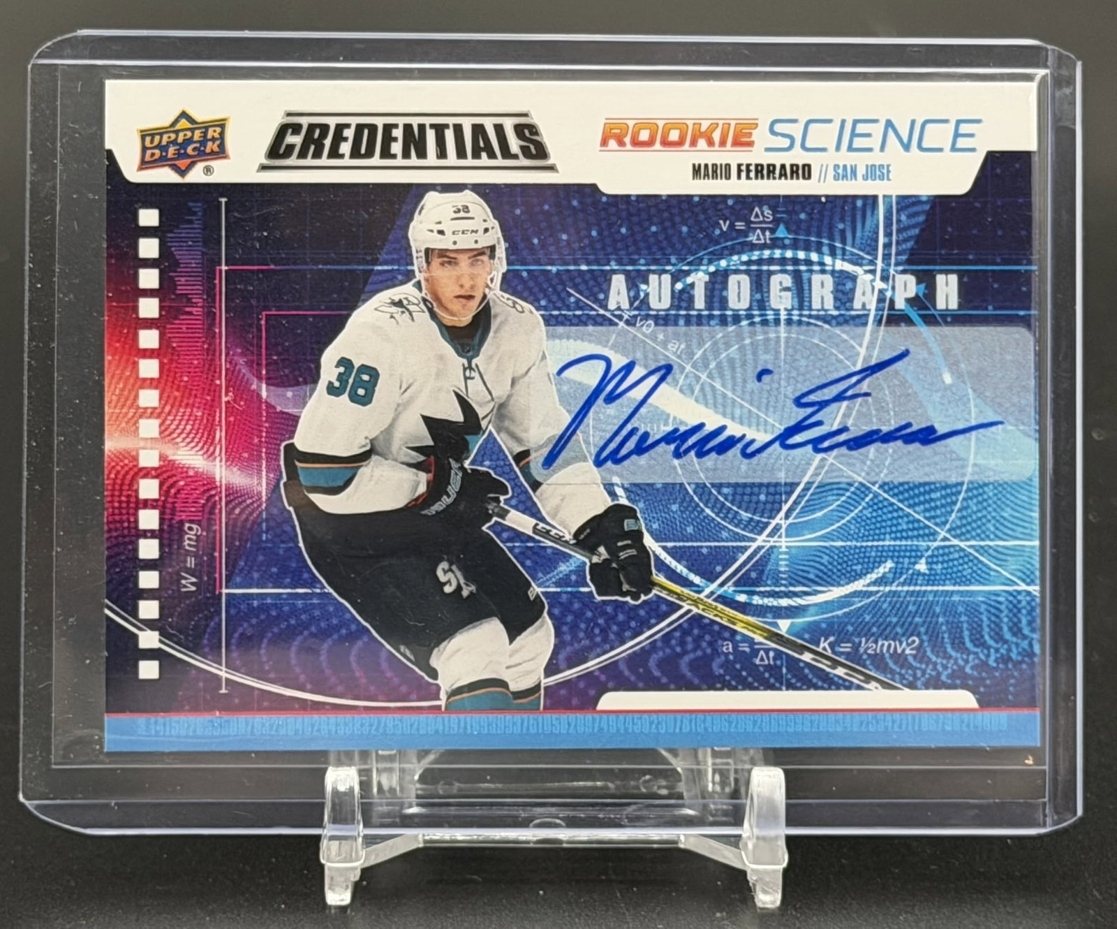 Mario Ferraro 2019-20 Upper Deck Credentials Rookie Science Auto RC RS-28 Certified Autograph: Official 2019-20 Upper Deck Credentials Rookie Science Autograph card featuring Mario Ferraro of the San Jose Sharks. This desirable Rookie Science insert (RS-28) features a blue ink on-card autograph