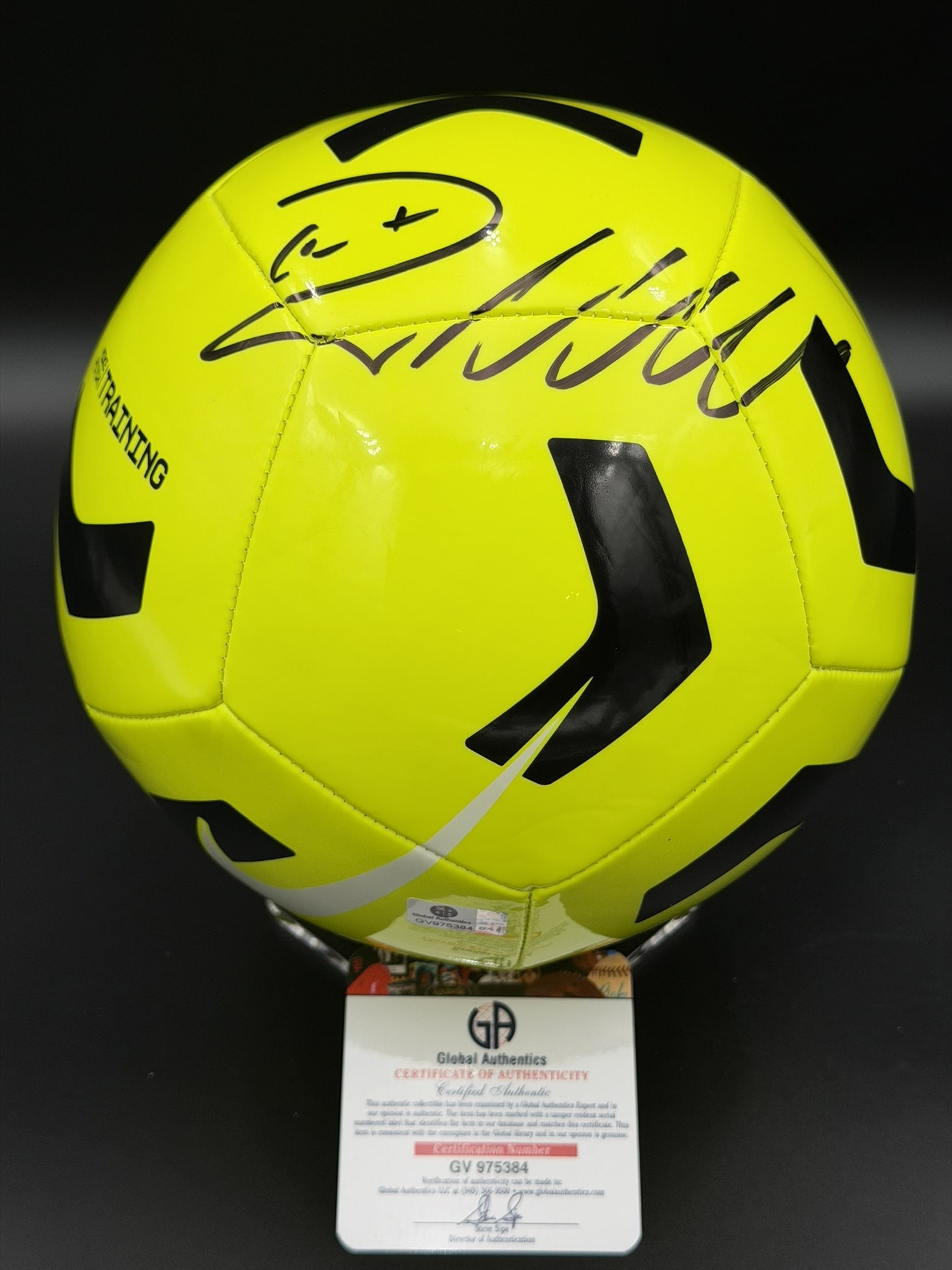 Cristiano Ronaldo Signed Yellow Soccer Ball GA COA NWOT: Yellow soccer ball personally signed by Cristiano Ronaldo in black marker. The ball features a bright pink and black panel design and includes a Global Authentics Certificate of Authenticity (COA) and