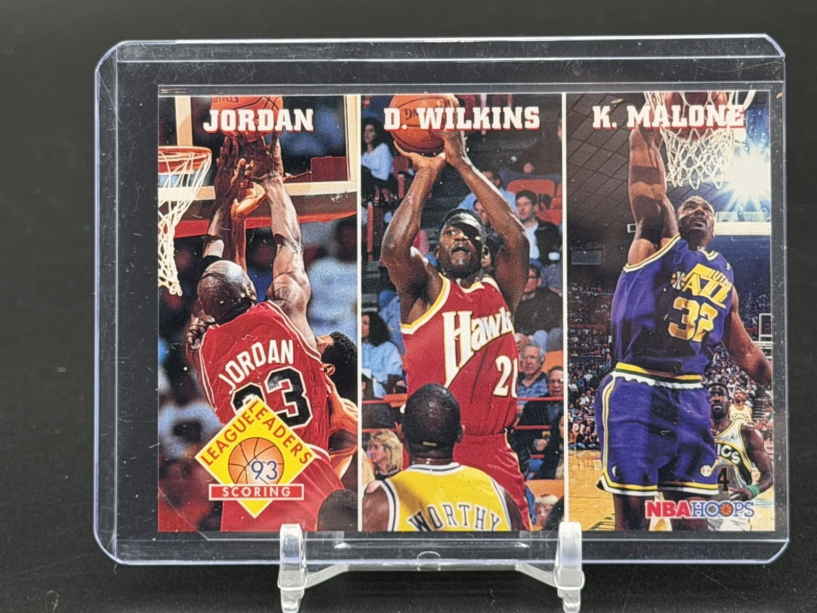 1993 SkyBox NBA Hoops League Leaders Scoring Michael Jordan #283 Chicago Bulls Vintage Multi-Player: Vintage 1993 SkyBox NBA Hoops League Leaders Scoring card #283, featuring three legendary Hall of Famers. The front of this card showcases three distinct action panels highlighting the league's top of