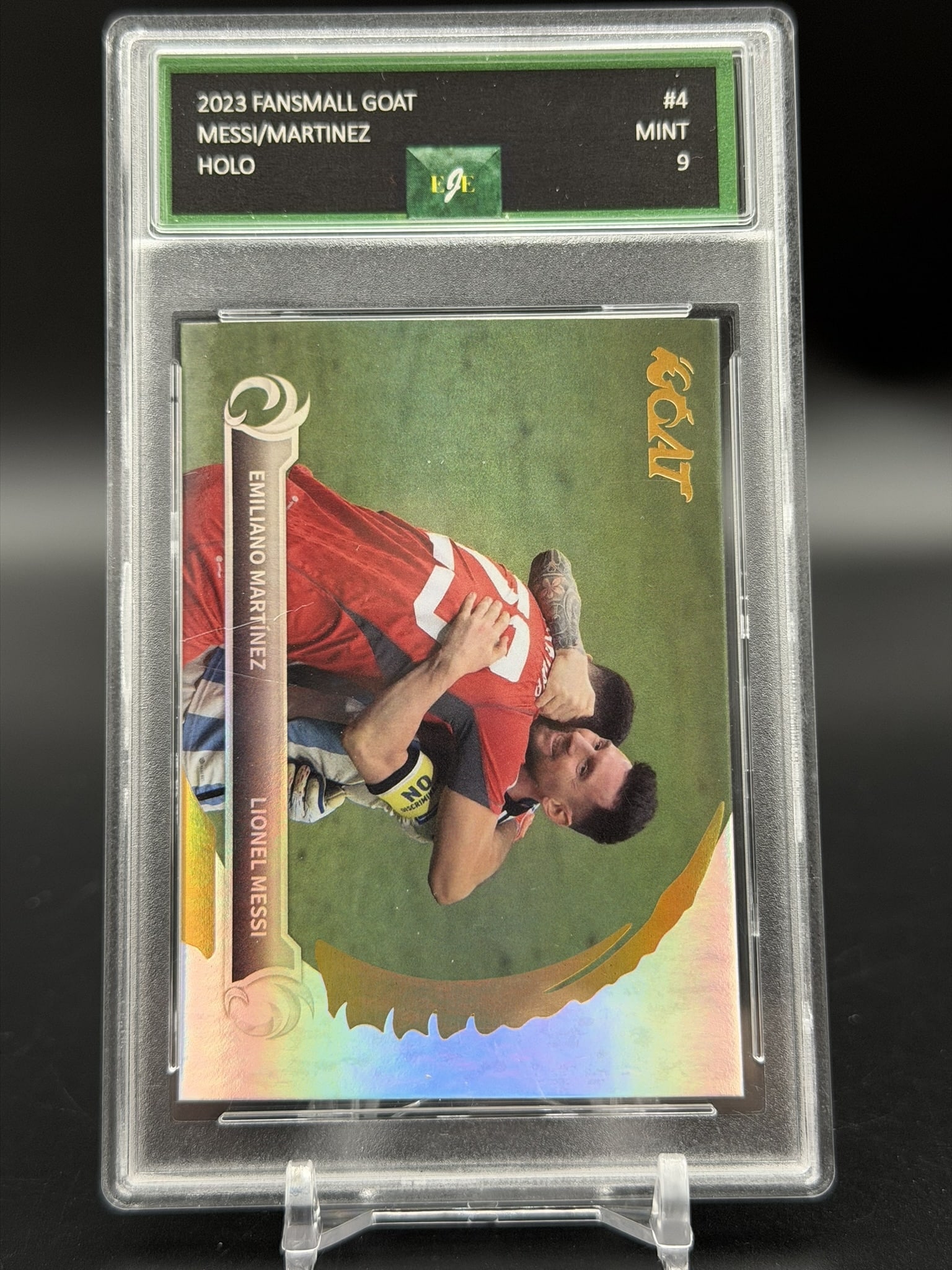 1 of 1 Grading Mint 9 2023 FansMall GOAT Holo Lionel Messi & Emiliano Martínez Argentina: Professionally graded Mint 9 by 1 of 1 Grading, this original 2023 FansMall GOAT Holo trading card features Argentine World Cup champions Lionel Messi and Emiliano Martínez. This premium hologr