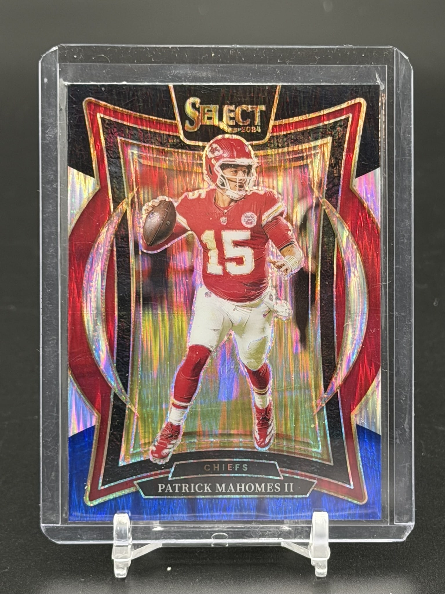 2024 Panini Select Concourse Patrick Mahomes II Prizm Kansas City Chiefs Football Card: Brilliant 2024 Panini Select Concourse Prizm card featuring superstar quarterback Patrick Mahomes II of the Kansas City Chiefs. Showcasing Select's signature chromium finish with vibrant prismatic ref