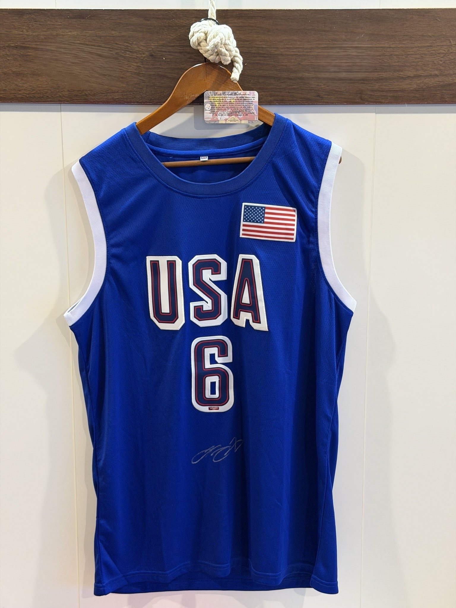 LeBron James Signed Team USA Basketball Jersey Size XL Red Carpet Authentics COA: Officially hand-signed LeBron James Team USA basketball jersey, size XL, accompanied by a Certificate of Authenticity. This royal blue mesh jersey features the genuine signature of the NBA legend and 