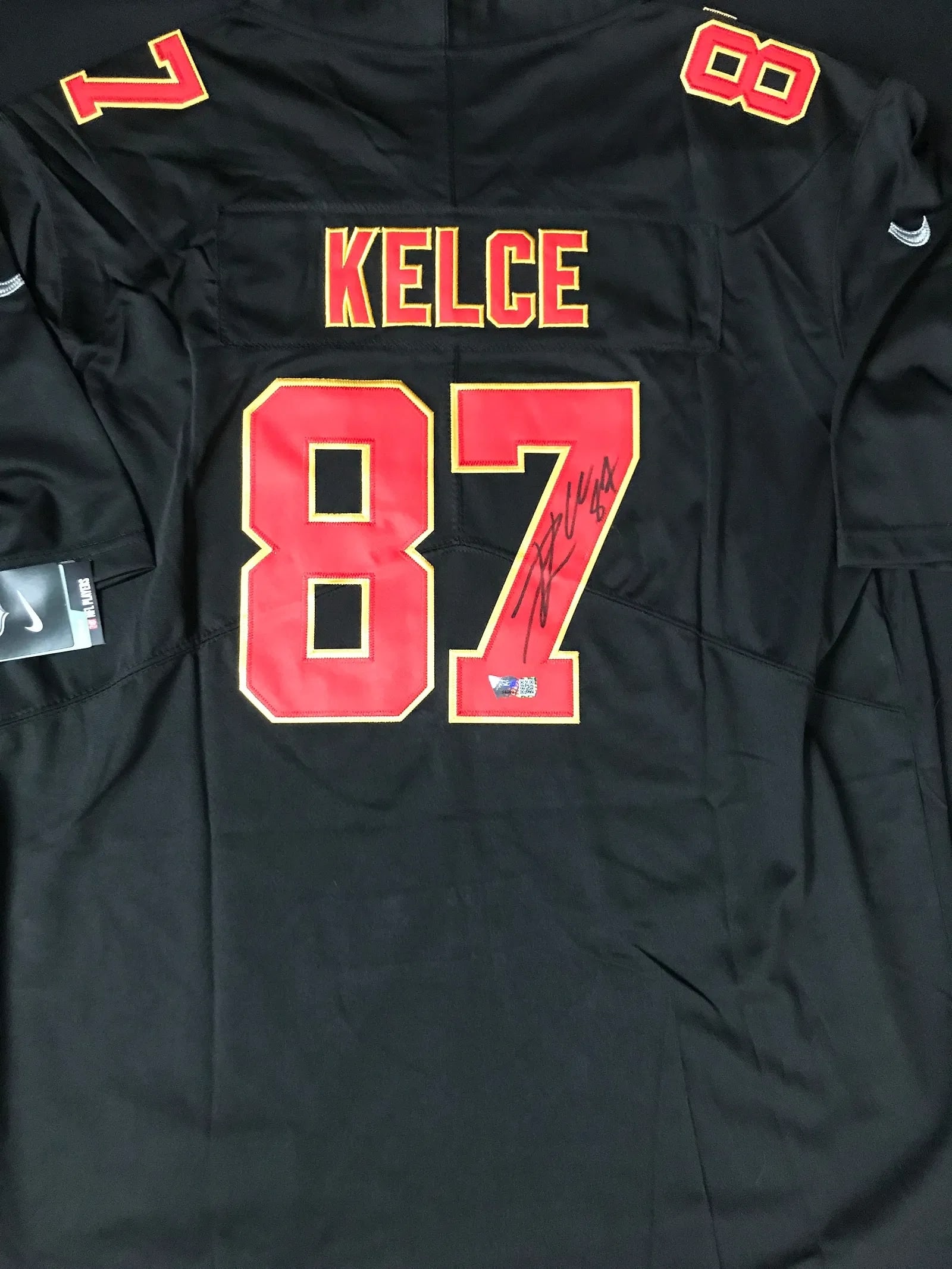 Travis Kelce Signed Nike On–Field Kansas City Chiefs Jersey – ACE COA: An official Nike On–Field Kansas City Chiefs jersey hand–signed by Travis Kelce, one of the defining tight ends in NFL history. This is a fully licensed Nike NFL jersey, featuring the offi