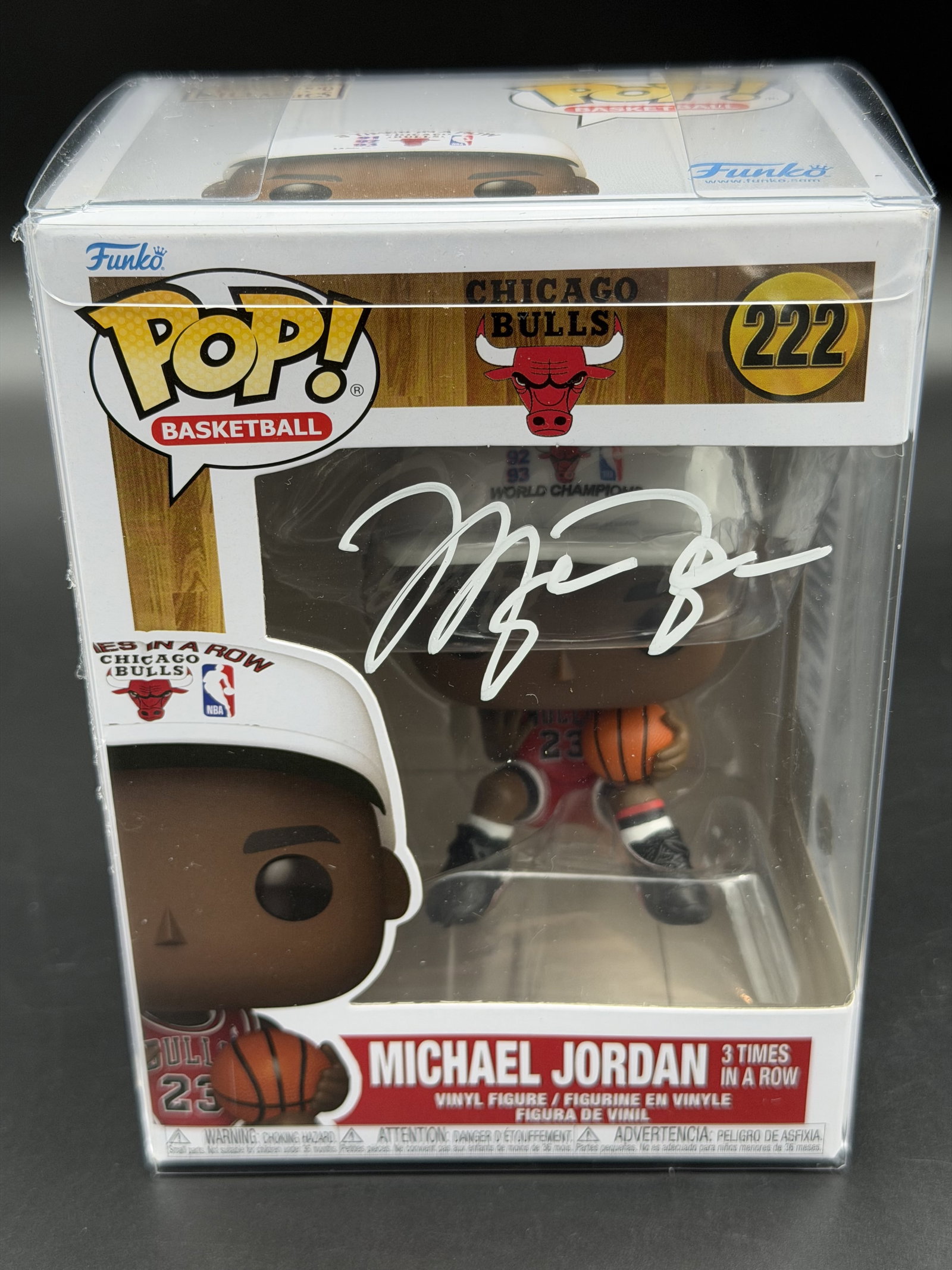 Autographed Michael Jordan Chicago Bulls "3 Times in a Row" Funko Pop! #222 Vinyl Figure Fanatics: Official Funko Pop! Basketball #222 vinyl figure depicting Michael Jordan in his Chicago Bulls uniform wearing the iconic "3 Times in a Row" championship cap, personally signed in bold white paint mar