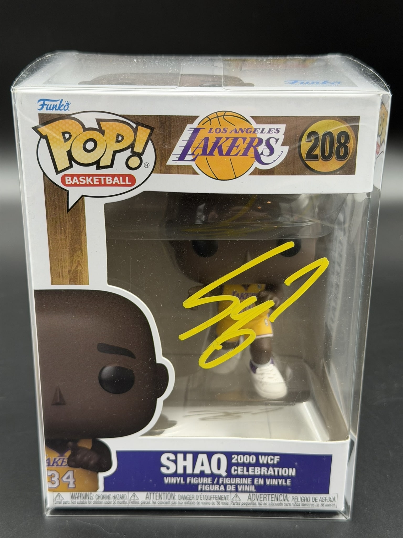 Shaquille O'Neal Signed Funko Pop! Basketball #208 "2000 WCF Celebration" Lakers Vinyl Figure AF2: Official Funko Pop! Basketball #208 "2000 WCF Celebration" vinyl figure depicting Shaquille O'Neal in his Los Angeles Lakers uniform, personally signed in yellow paint marker across the front window o