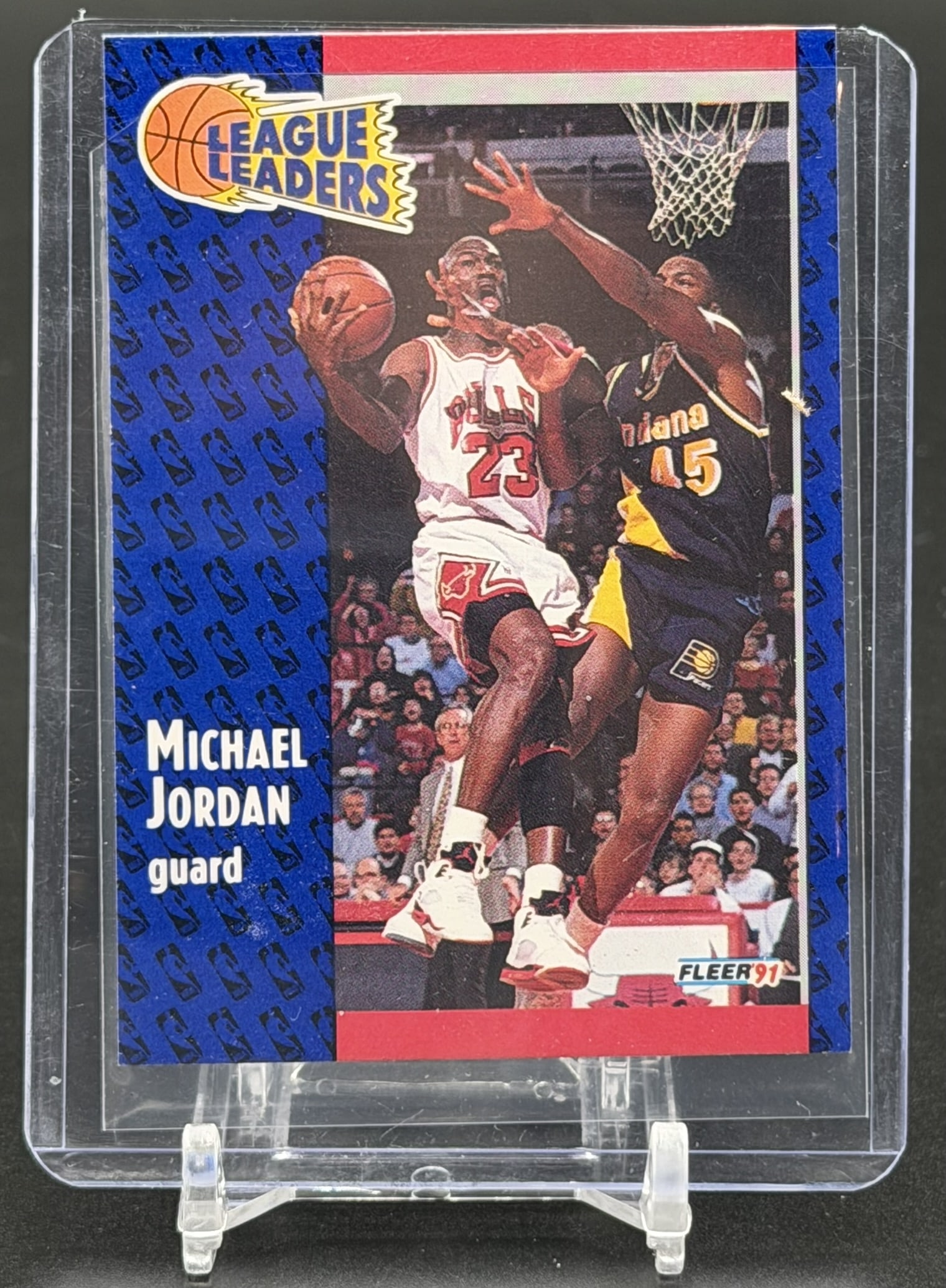 1991-92 Fleer Michael Jordan League Leaders Card #220 Chicago Bulls Vintage Basketball Legend: Vintage 1991-92 Fleer Michael Jordan League Leaders card #220 titled "The Ultimate Weapon," featuring the Chicago Bulls Hall of Famer. The front of this card showcases an action photograph of Jordan d