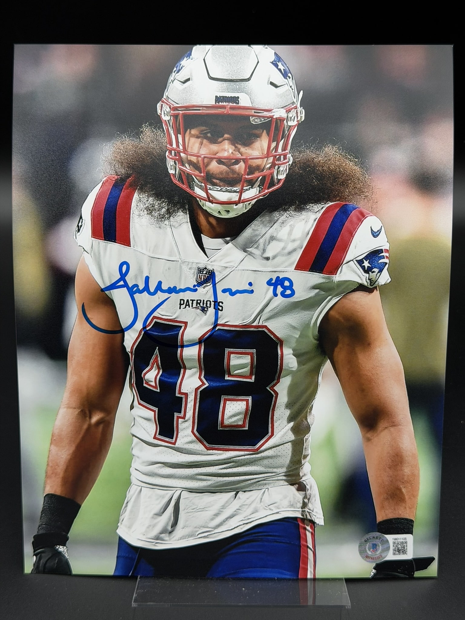 Autographed Jahlani Tavai New England Patriots 8" × 10" Photo Beckett COA: Jahlani Tavai personally signed 8" × 10" color photograph featuring the New England Patriots linebacker in game action wearing his Patriots uniform. The close-up image has been signed in blue ma