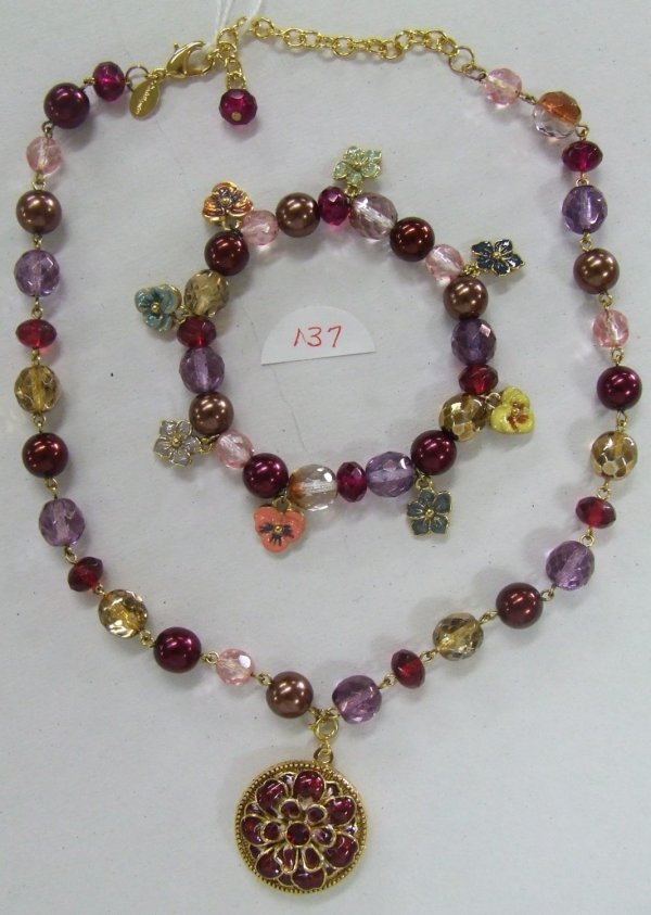 Joan Rivers Czechoslovakian Glass Bead Set: 18" Czechoslovakian glass bead necklace in copper, wine, and purple features a floral locket and matching 7" stretch bracelet with enameled flower charms; boxed