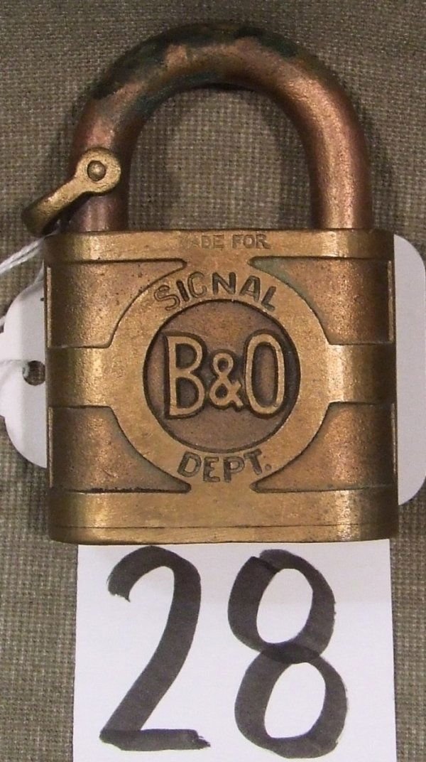 Baltimore & Ohio Lock: Yale brass signal lock is marked "Baltimore & Ohio" - Chicago Division and measures 3" tall and 2" wide; no key.