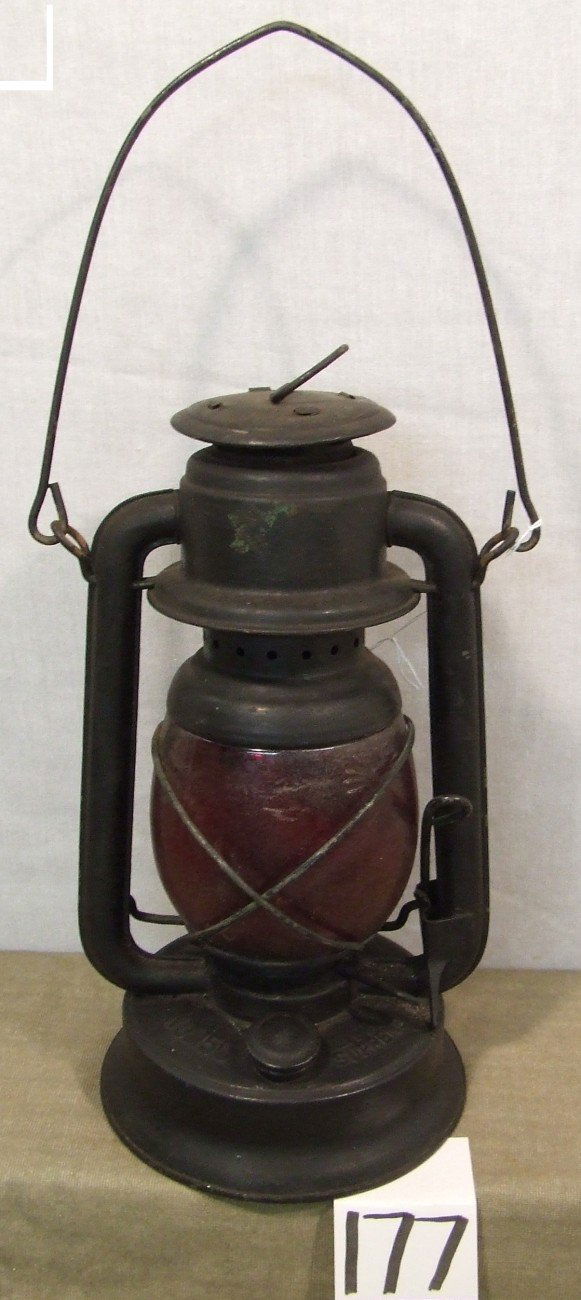 Embury No. 150 Lantern: Embury Little Supreme No. 150 all purpose lantern has a red globe embossed with No.10E; 11.5" body with total height of 16.5" with bail up.