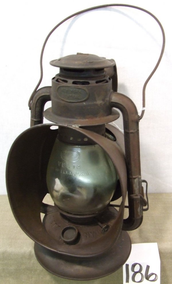 New York Central Inspector Lamp: Dietz Ideal Little Wizard inspector lamp; marked "New York Central" with clear globe; body is 11" tall - total height 16" with bail.