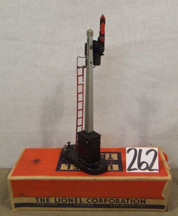 Lionel #151 Semaphore: Operating semaphore, #151, has a black metal base and unpainted aluminum pole with painted plastic blade; 9" tall. Partial box; 1947-69.