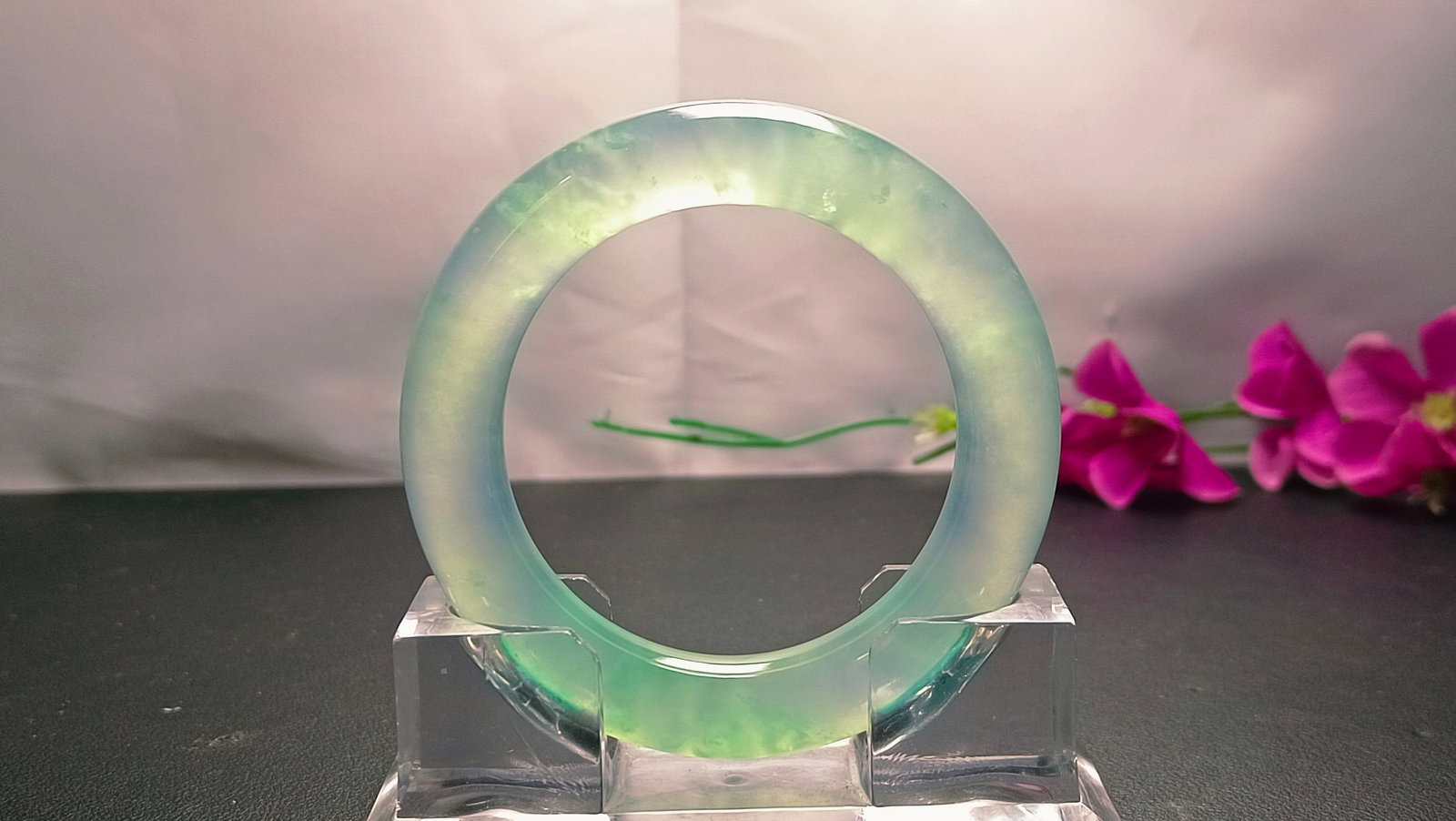 Dragon Stone Type Icy Floating Flower Jadeite Bangle: Dragon Stone Type Icy Floating Flower Jadeite Bangle Provenance:Private collection of a retired doctor, Sydney, Australia. Our cooperative logistics services provider expertly handles both domestic an