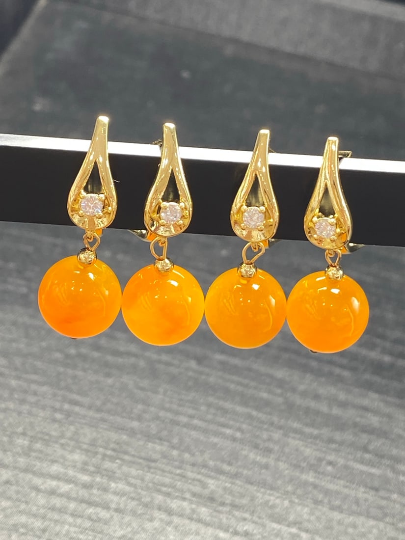 High-quality jadeite earrings set with yellow jade. (1 of 9)
