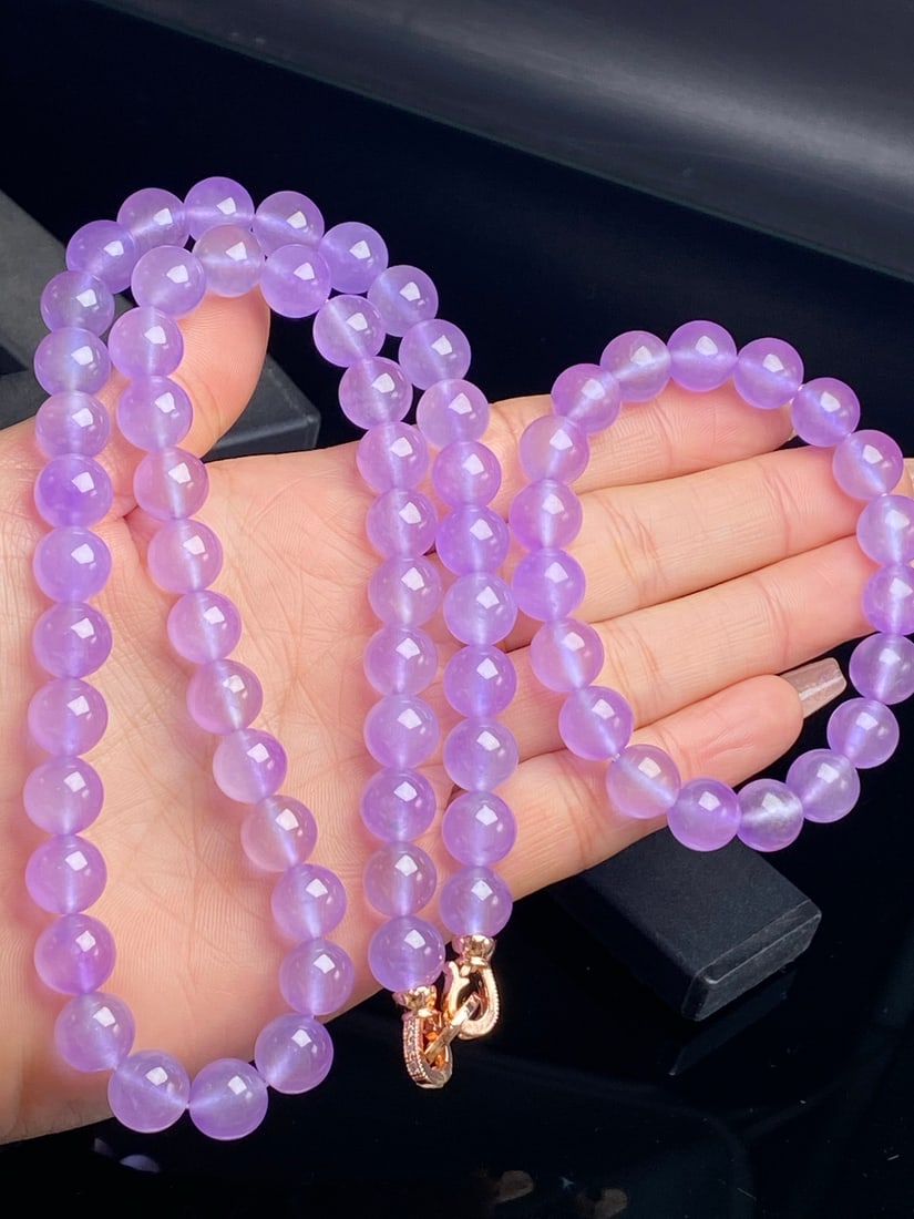 High-quality icy violet jadeite necklaces and bracelets are icy, translucent, and lustrous.: High-quality icy violet jadeite necklaces and bracelets are translucent and lustrous, with each bead perfectly round and full. Provenance:Private collection, Warsaw , Poland. Our cooperative logistics