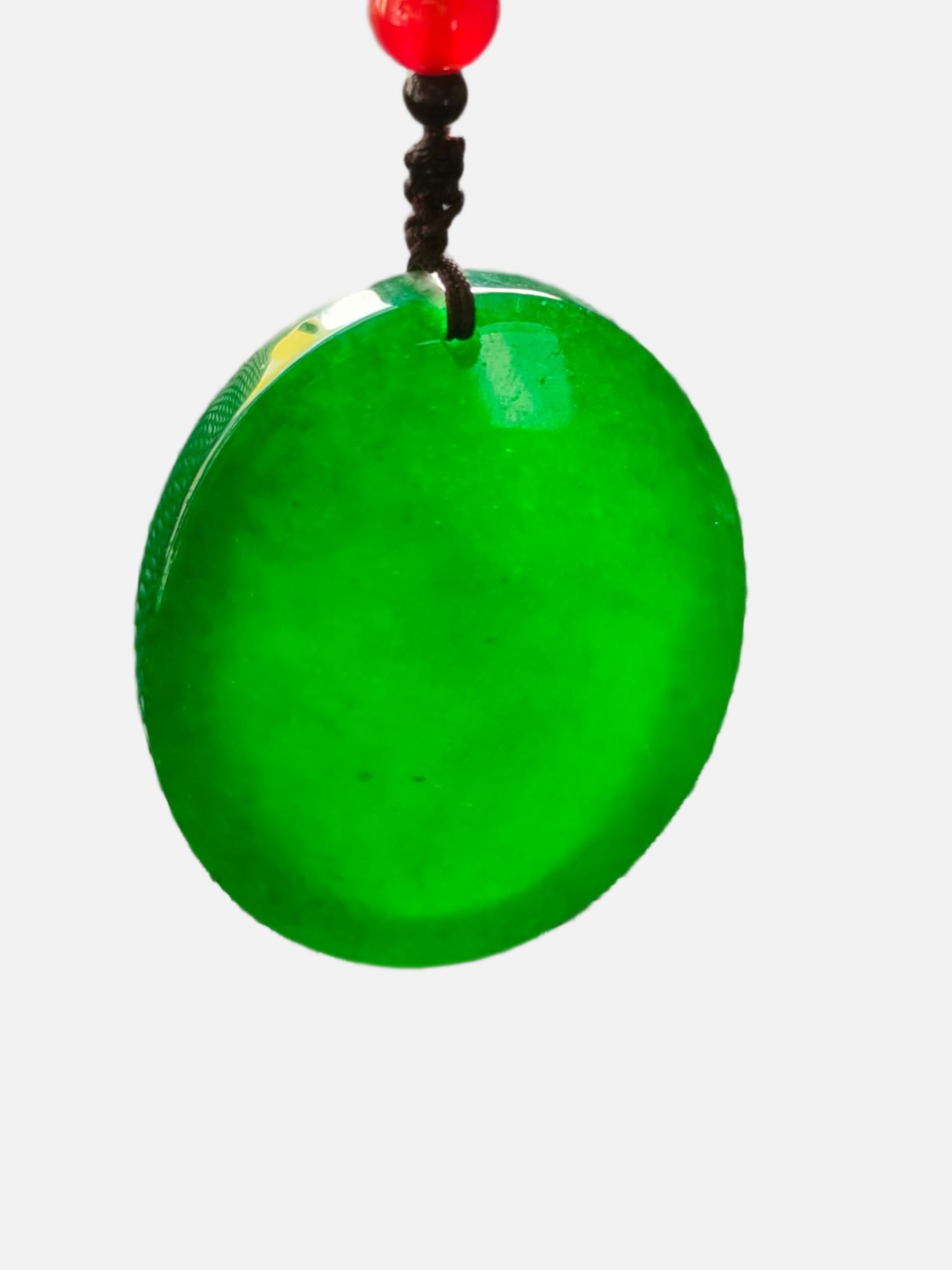 Top-grade imperial green jadeite cabochon pendant: Top-grade imperial green jadeite cabochon pendant Provenance:from a private collector in Bucharest, Romania. Our cooperative logistics services provider expertly handles both domestic and global shipp