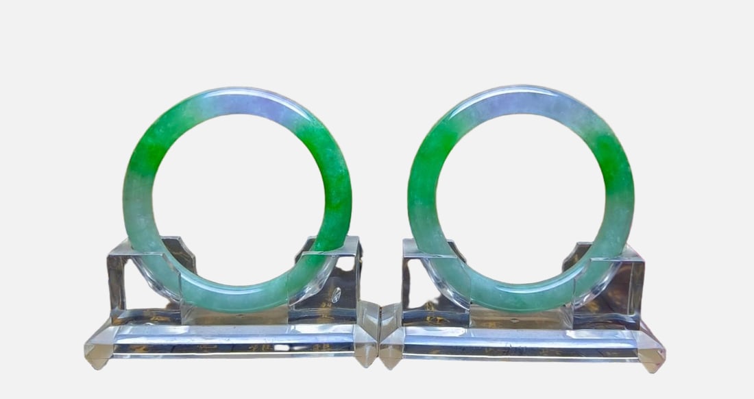 A pair of dragon-stone jadeite bracelets with floating flowers (1 of 5)