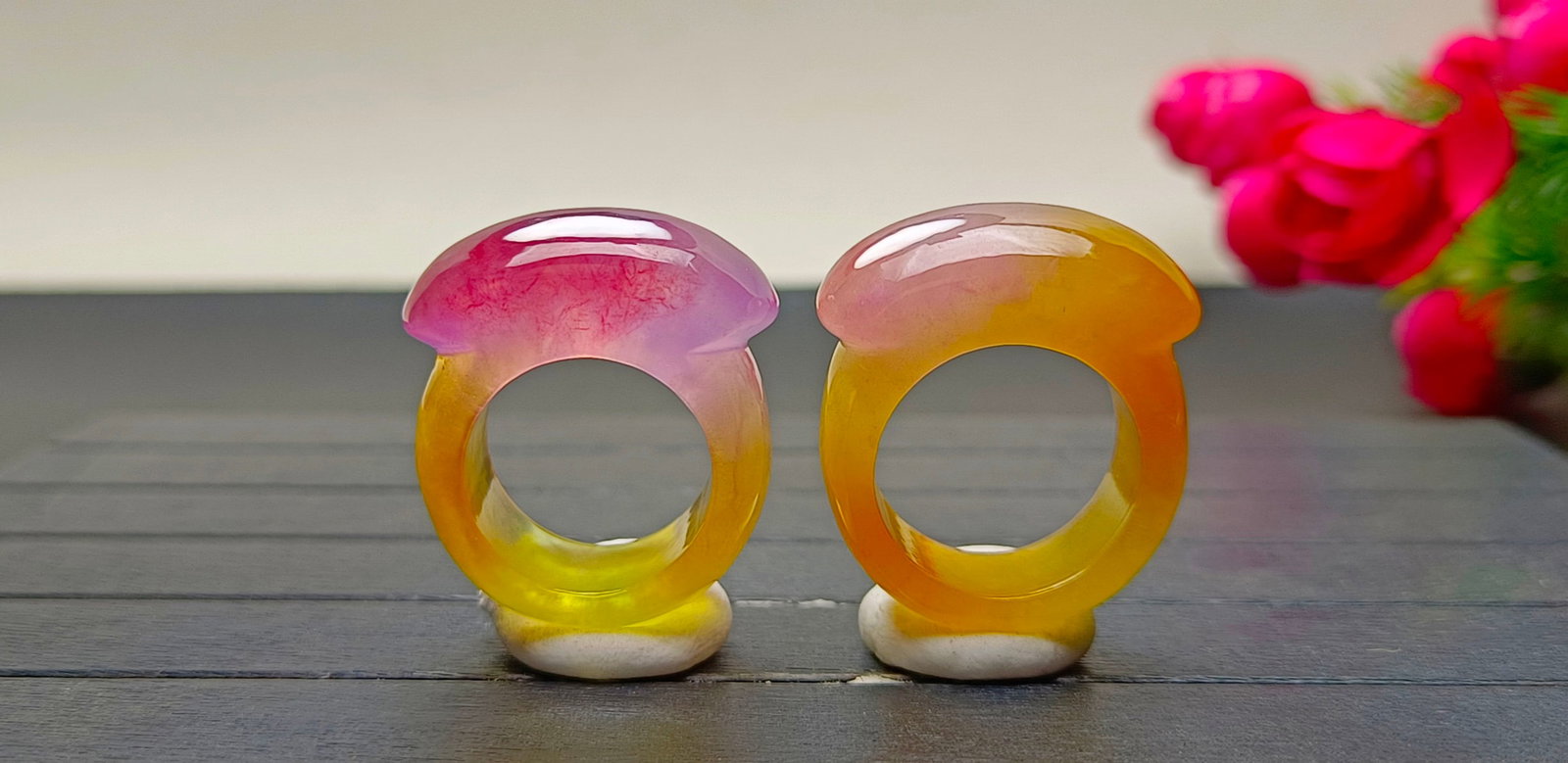 A pair of top-grade dragon stone type multicolored jadeite saddle rings: pair of top-grade dragon stone jadeite saddle rings, with excellent translucency and absolutely perfect quality. Provenance:from a private collector in Ankara, Turkey. Our cooperative logistics servic