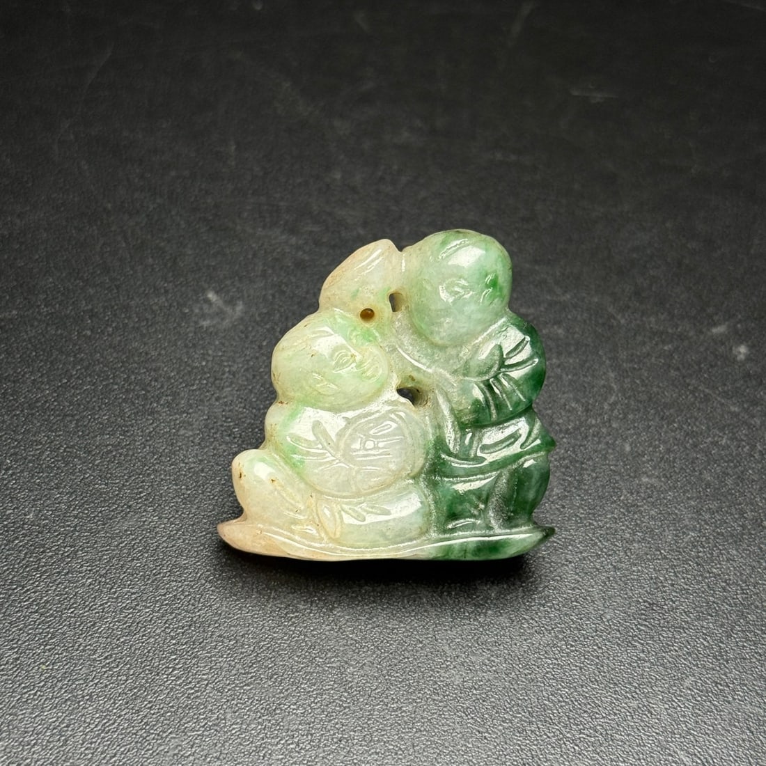 Old collection jade pendant, Ruyi Boy: This is a jade pendant from my collection, depicting a ruyi-shaped child, symbolizing harmony and happiness. The design is simple and elegant, the carving skillful, the jade is warm and lustrous, and