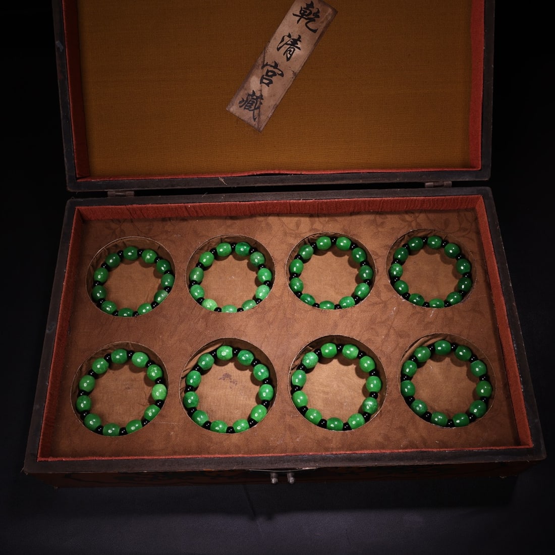 Rare jadeite bracelet/bead set from a Qing Dynasty imperial collection.: Rare jadeite bracelet/beads from the Qing Dynasty imperial collection, in excellent condition and exquisite design, accompanied by an antique lacquer box. Provenance:Private collection, Athens, Greece