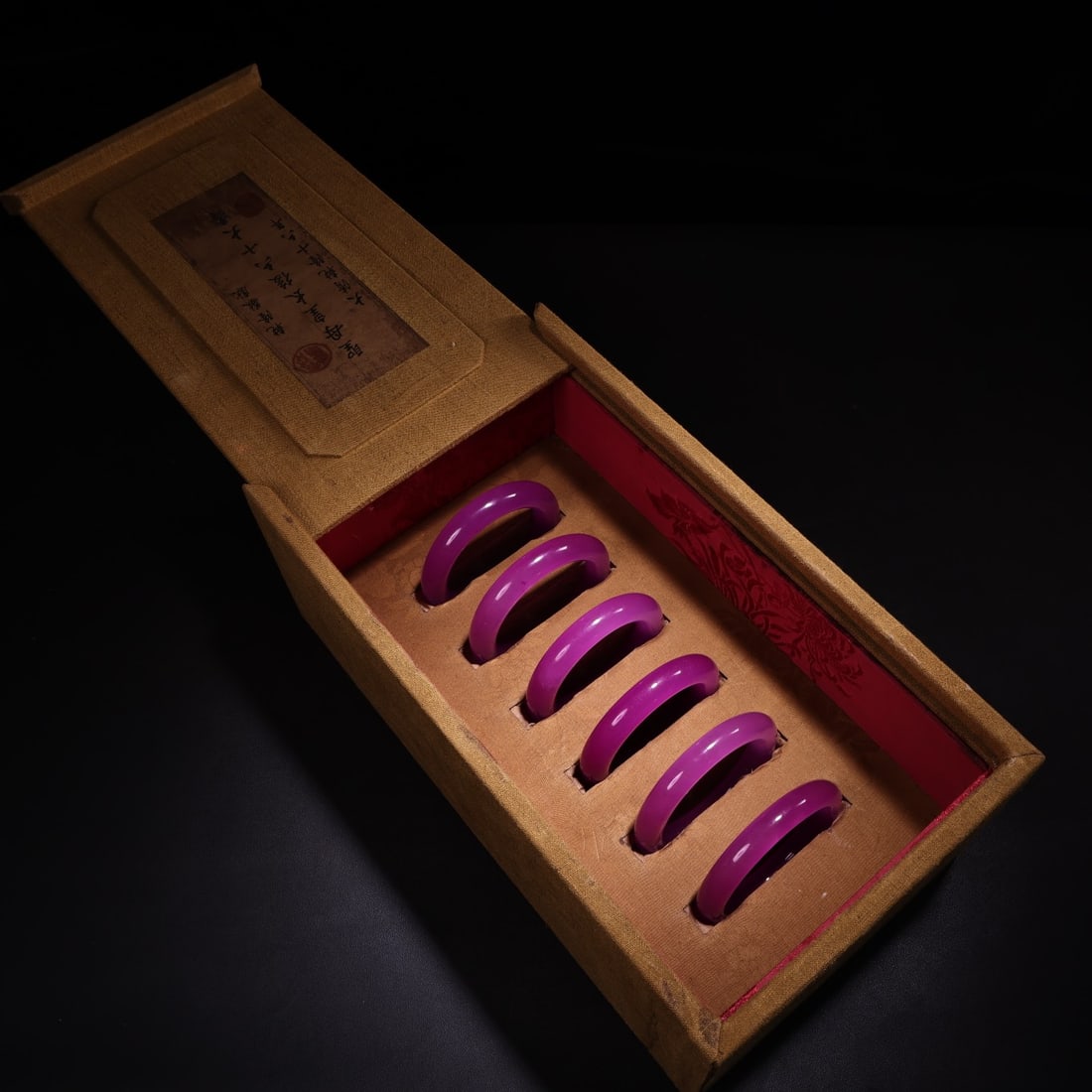 Rare and exquisite Qing Dynasty imperial collection: a box containing a high-quality, icy jadeite: Rare and exquisite Qing Dynasty imperial jadeite bangle, a high-quality icy jadeite bangle in a well-preserved old cloth box. Provenance:Private collection, Athens, Greece. Our cooperative logistics s