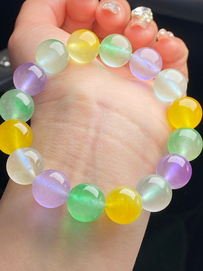 Jadeite Icy Multi-Gemstone Bracelet: The jadeite multi-gemstone bracelet is icy and translucent, with each bead perfectly round and full. Provenance:Private collection, Athens, Greece. Our cooperative logistics services provider expertly