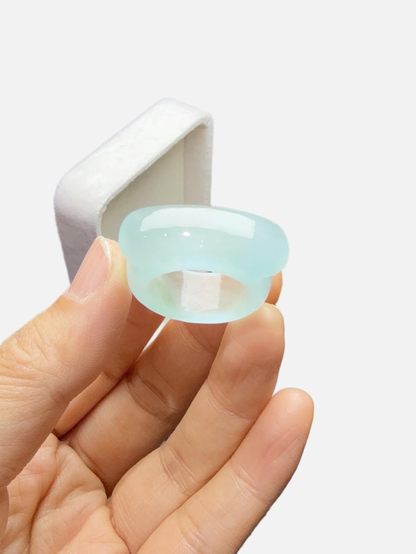 Jadeite icy "saddle ring": The jadeite icy "saddle ring" is lustrous and translucent, exquisitely three-dimensional, and perfectly crack-free. Provenance:Private collection, Kiev, Ukraine. Our cooperative logistics services pro