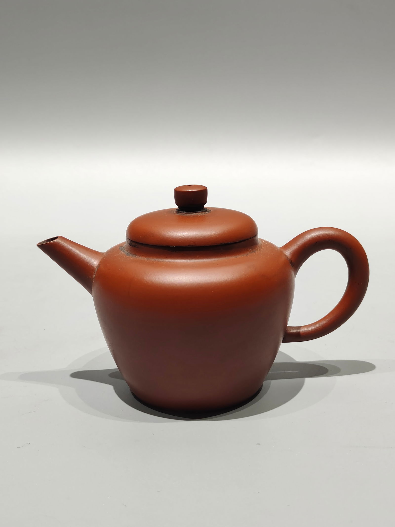 A treasured antique purple clay teapot, featuring a leaf-shaped inscription on the bottom of a (1 of 7)