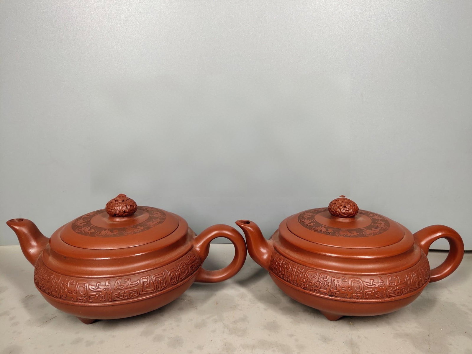 A pair of handcrafted purple clay teapots by famous artists (1 of 13)