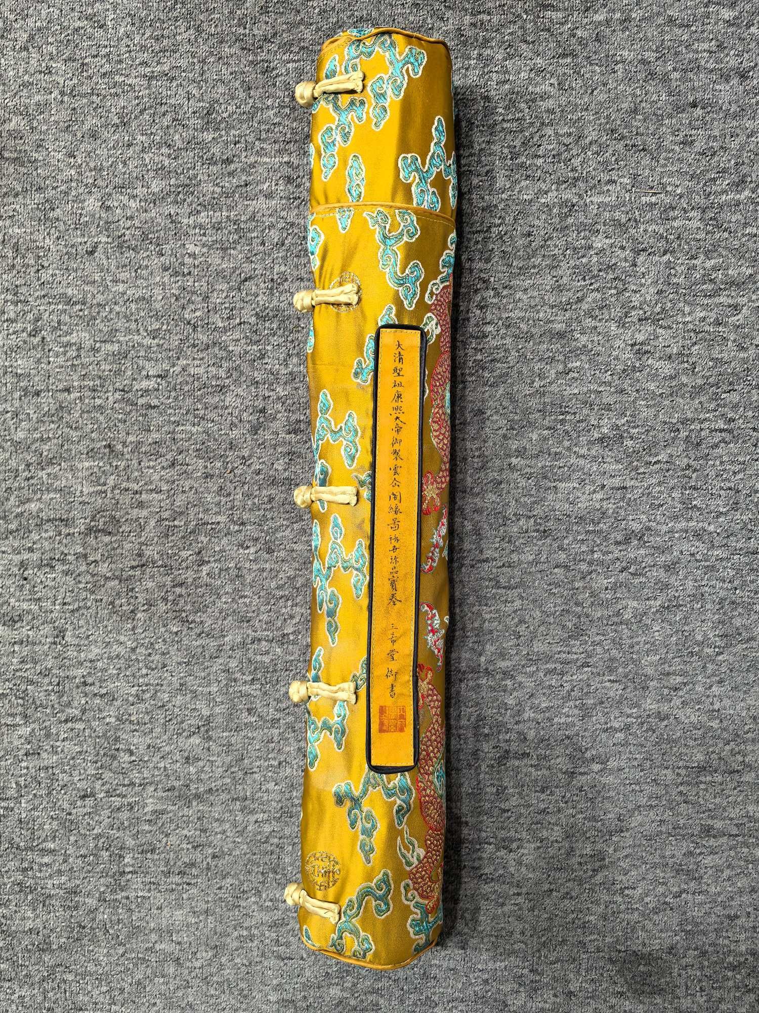 Cloud Pavilion Immortal Destiny Map: The exquisite silk scroll painting "Immortals in the Cloud Pavilion," commissioned by Emperor Kangxi of the Qing Dynasty, measures approximately 57 cm x 7.5 meters, with the painting itself measuring