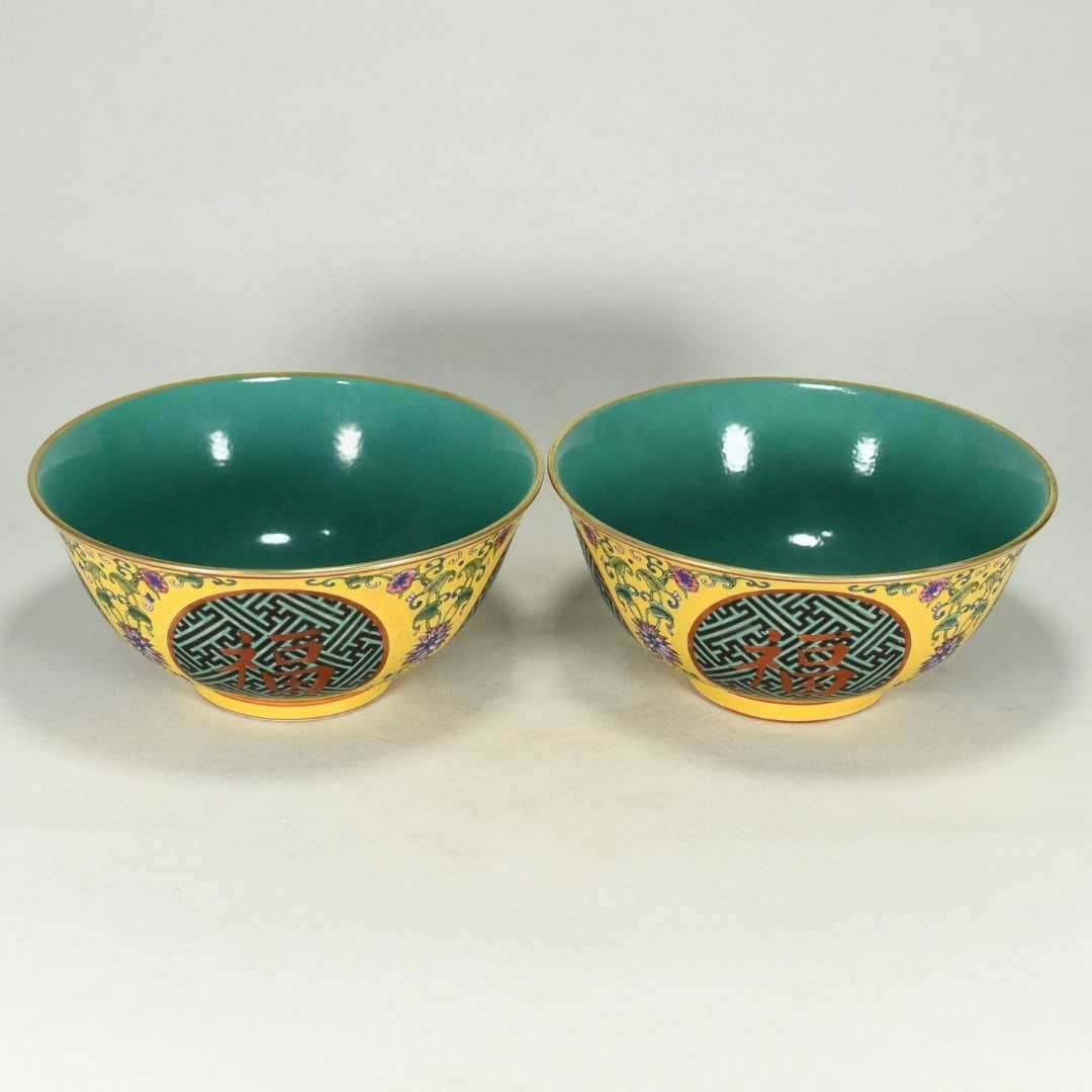 A famille rose gilt bowl with auspicious symbols of fortune, prosperity, longevity, and happiness,: Made during the Yongzheng reign of the Qing Dynasty, a famille rose gilt bowl with auspicious motifs of fortune, prosperity, longevity, and happiness, measuring 8 cm in height and 16.6 cm in diameter.