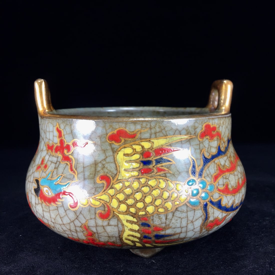 A Song Dynasty official kiln painted and gilded incense burner with dragon and phoenix design, now (1 of 9)