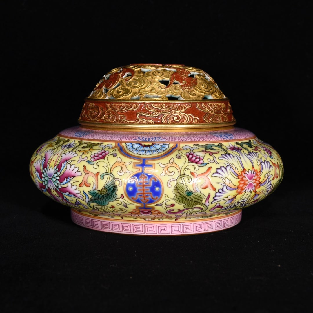 A Qing Dynasty Qianlong period enamel-gilt incense burner with a design of five blessings: A Qing Dynasty, Qianlong period, enamel-gilt incense burner with a design of five blessings surrounding a longevity symbol, 9??14 cm Provenance:Private collection from a professor in KTH Royal Institu