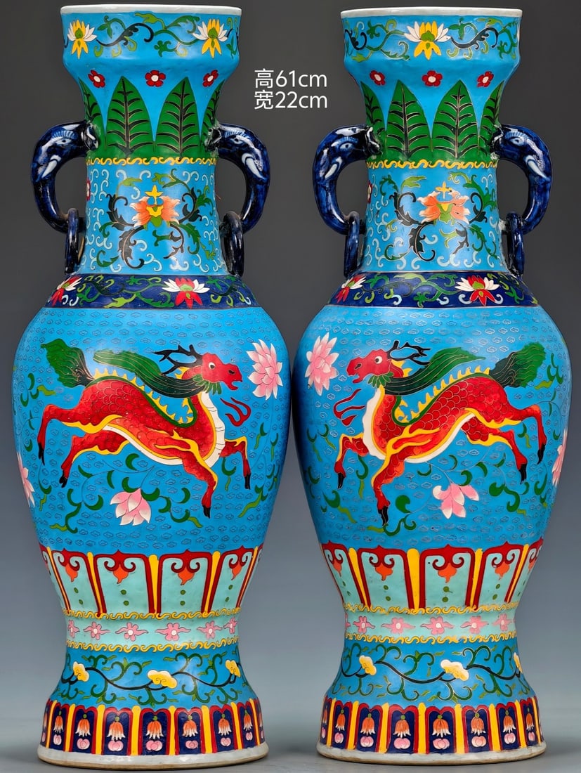 A pair of cloisonne enamel painted phoenix and deer elephant-ear vases from the mid-to-late Ming: pair of cloisonne enamel elephant-ear vases, 61x62cm, from the mid-to-late Ming Dynasty, featuring phoenix and deer motifs. The vases are exquisitely crafted, their entire surface decorated with clois