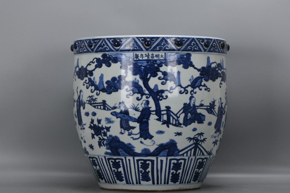 A large blue-and-white porcelain jar depicting figures and stories from the Jiajing period of the (1 of 9)