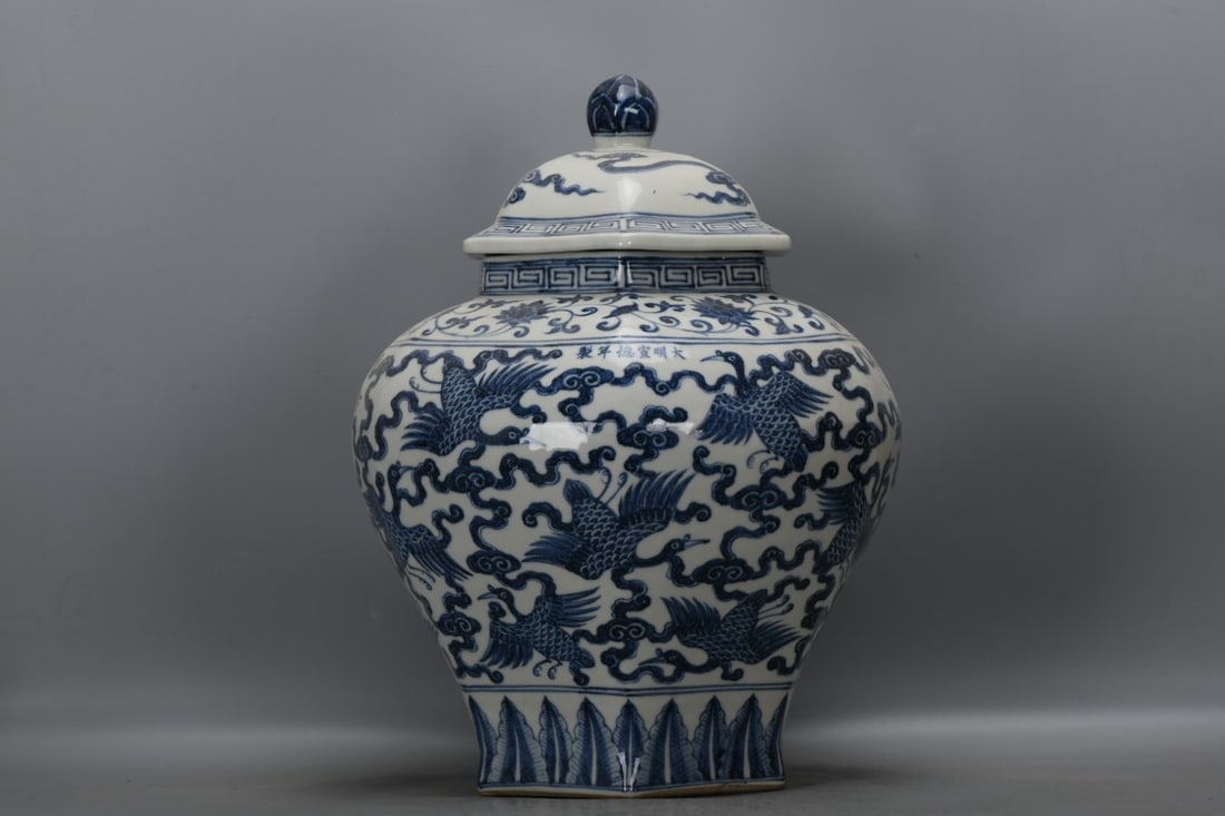 A Ming Dynasty Xuande period blue and white porcelain jar with lotus, auspicious clouds, and crane (1 of 9)