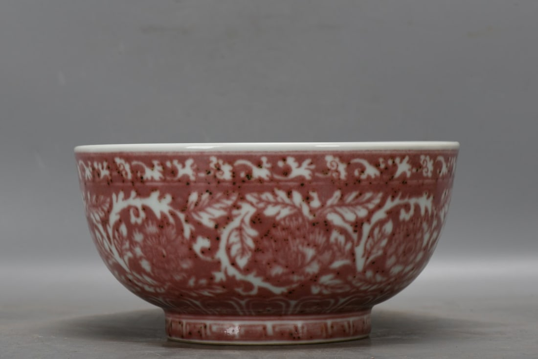 A Ming Dynasty, Yongle period underglaze red lotus scroll bowl (1 of 8)
