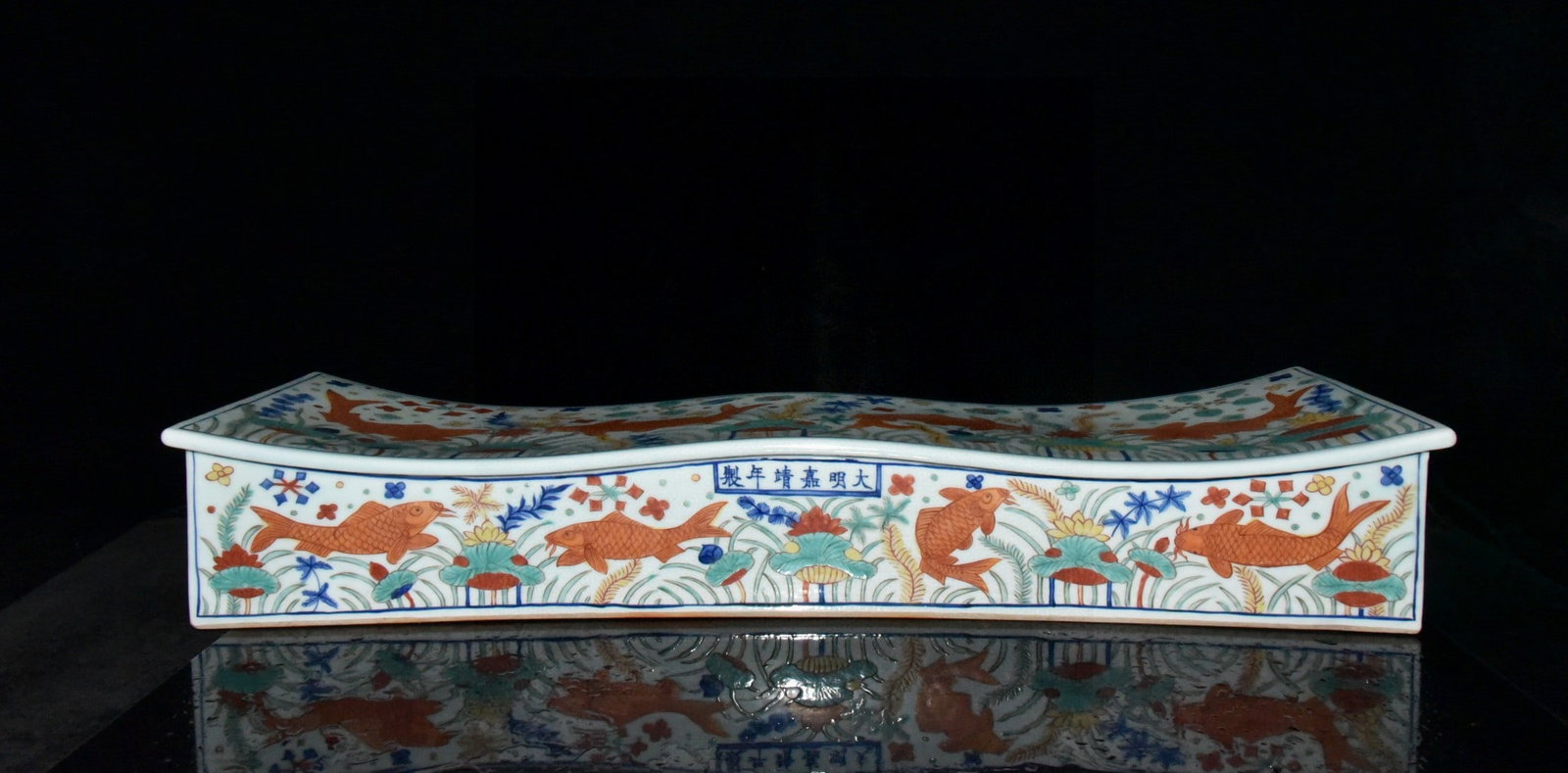 Ming Dynasty Jiajing Period Five-Color Fish and Algae Pattern Double Pillow: A Ming Dynasty Jiajing period polychrome double pillow with fish and algae design, 10.2 x 19.5 x 62 cm. Provenance:Private collection from a professor in ESC Rennes School of Business. Our cooperative