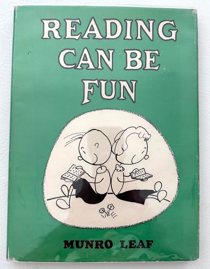Munro Leaf. Reading Can Be Fun.: Philadelphia: 1953. With numerous b/w drawings by the author; first edition; front fly leaf with a full page presentation and three original drawings, SIGNED by Leaf; fine in slightly chipped jacket.