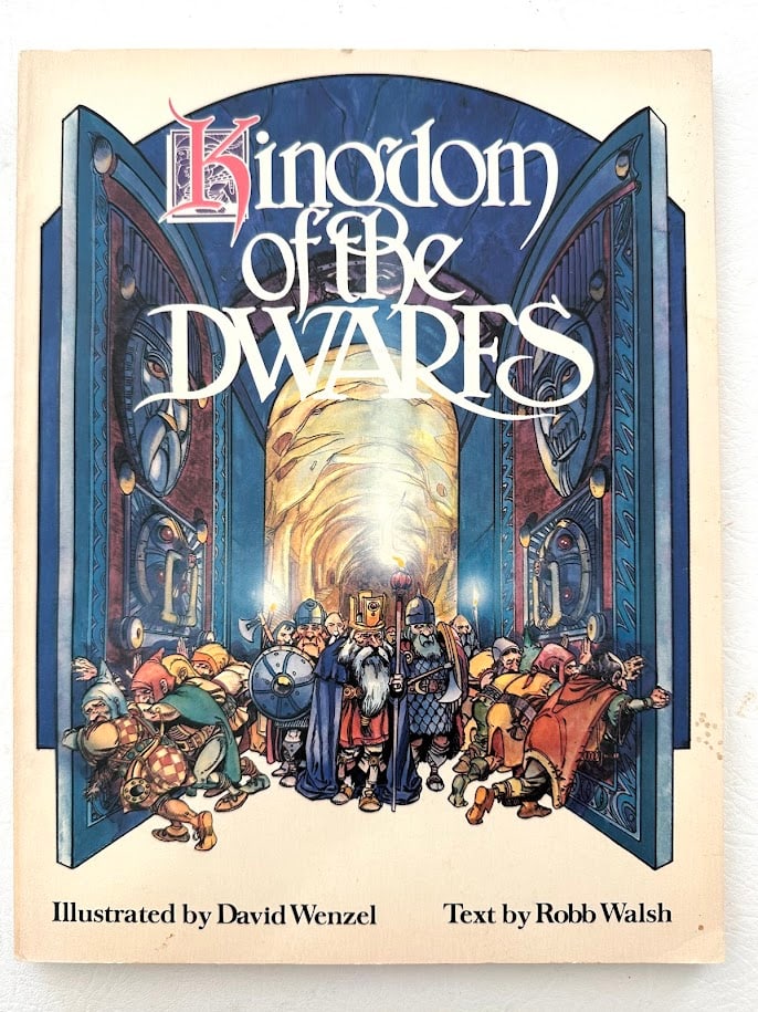 Robb Walsh. Kingdom of the Dwarfs.: New York: 1980. With color and b/w illustrations by David Wenzel; first edition; presentation copy SIGNED and dated 11/80 by Wenzel, with a 3" x 4" original pen & ink drawing. Color pictorial card
