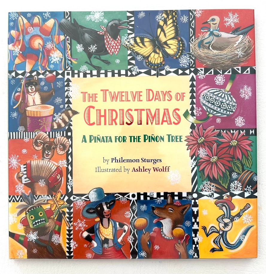Philemon Sturges. The Twelve Days of Christmas.: New York: 2007. First printing. Color illustrations by Ashley Wolff. Title page with an original drawing of a dog - "Howlin' good Wishes!", SIGNED by Wolff. Fine in jacket.