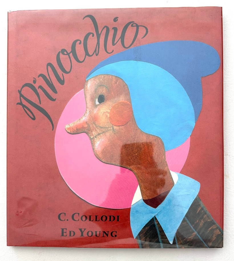 Ed Young. Pinocchio.: New York: 1996. First printing. Illustrated with color illustrations by the author; SIGNED by Young in gold ink on the title page. Fine in jacket.