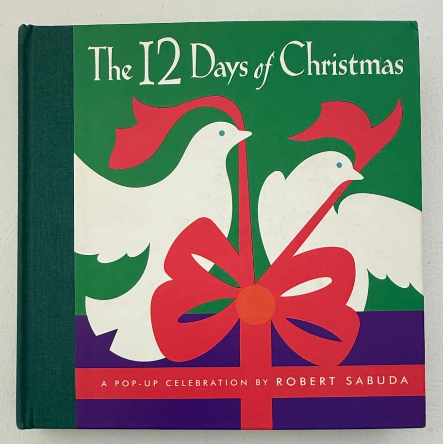 [POP-UP] Robert Sabuda. The 12 Days of Christmas.: New York: 1996. First printing. Illustrated with color pop-ups by Sabuda. SIGNED by Sabuda with added sentiment "Merry Twelve Days of Christmas! Best wishes" Fine copy.