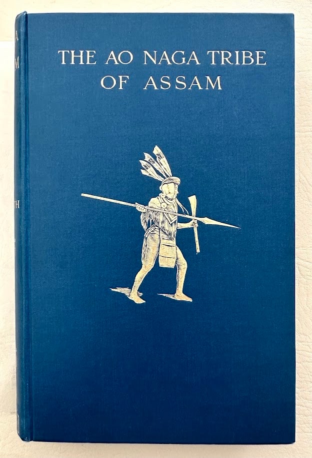 William Smith. The Ao Naga Tribe of Assam. A Study in Ethnology and Sociology. Signed: London: 1925. 8vo; illustrated; cloth binding with a gilt figure on the front cover. First edition. Presentation copy SIGNED "with the author's compliments".