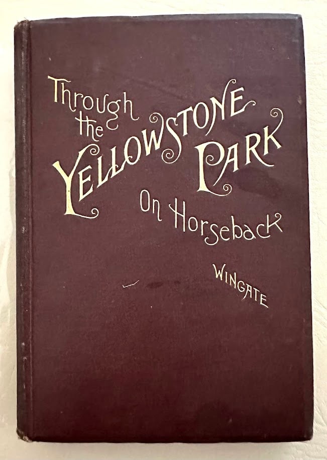 George W. Wingate. Through the Yellowstone Park on Horseback. First edition with map: New York: O. Judd Co, 1886. 12mo; 250pp + vi adverts; gilt lettered cloth; illustrated; with the folded map in a pocket at the rear; with the pencilled signature of A. Offney. A gently used copy.