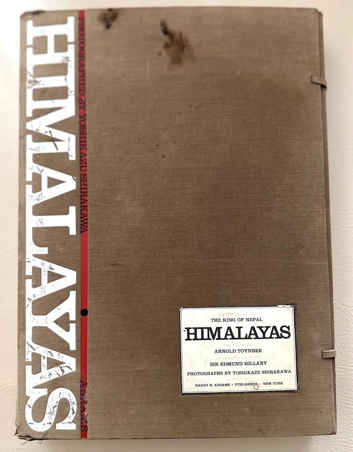 Yoshikazu Shirakawa. Himalayas.: New York: Abrams, 1971. Folio; heavy boards; with 248 full page color illustrations, 6 muli-page foldout color plates, plus 6 maps and diagrams. Essays by Yoshikaza Shirakawa on the Nepal Himalayas,