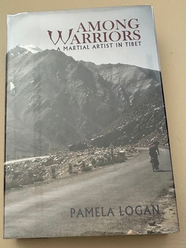 Pamela Logan. Among Warriors. A Martial Artist in Tibet.: Woodstock: 1996. 8vo; 266pp + glossary; cloth backed boards; color pictorial jacket; illustrated with photographs; fine copy. First edition.