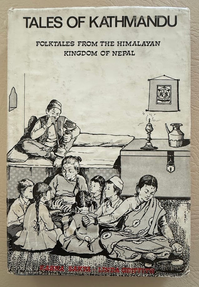 Karna Sakya. Tales of Kathmandu. Folktales from the Himalayan Kingdom of Nepal.: Brisbane: 1980. 8vo; 256pp; cloth with printed paper overlay; illustrated; front inner hinge slightly cracked; covers with some slight bubbling, otherwise very good. First edition, limited to 3000 cop
